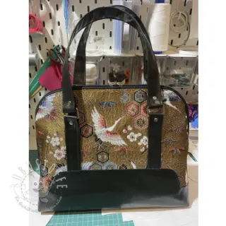 Dekostoff jacquard Grues or